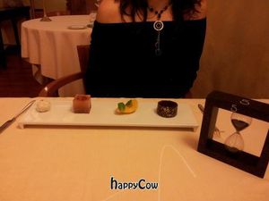 The chocolate cake. Brought with a hourglass. Just to remember taking it easy... at Joia Alta Cucina Naturale in Milan