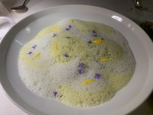 Under a colorful blanket  at Joia Alta Cucina Naturale in Milan