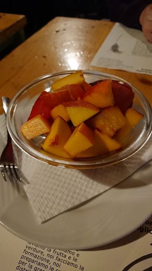 Lovely fruit salad with a squeeze of lemon. Best nectarines ever! at Amico Bio - Un Sorriso Integrale in Naples
