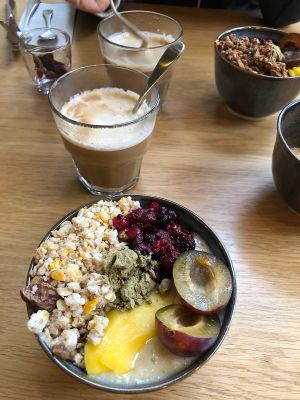 Breakfast bowl and coffee with soymilk at Harmonie Bowl & Juice in Strasbourg