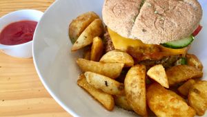 Burger and patatas bravas at Jardin Urbano in Valencia