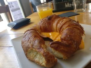 'Ham' and 'cheese' croissant with some cream. A great snack at Jardin Urbano in Valencia