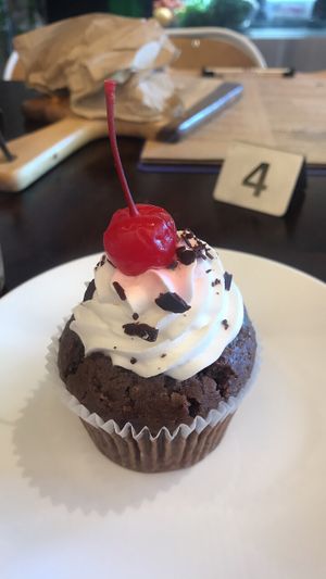 Black Forest cupcake with soy whip  at Oh My Greens in Melton South