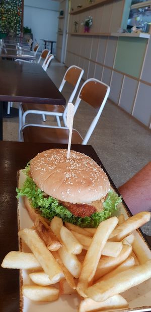 Chic burger with chips at Oh My Greens in Melton South