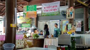 The juice and fresh produce cashier. at Chiang Mai Vegetarian Society in Chiang Mai