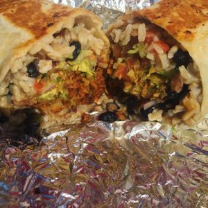 Vegan tofu burrito- no cheese sub guacamole  at Mojos Tacos in St Augustine