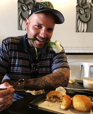 romantically enjoying Cuban style papa rellena (stuffed potato ball) with an affogato on the side  at White Rose Coffee in Miami