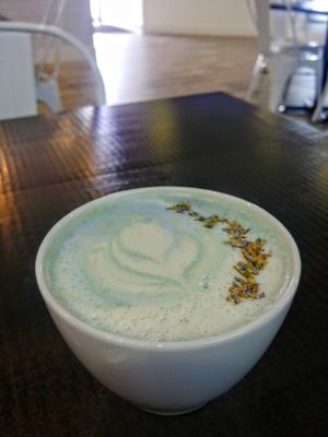 Butterfly Pea Flower latte with oatmilk at White Rose Coffee in Miami