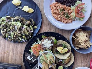 Aguachile, tofu a la mexicana, starter platter- guacamole/chips & pastor tacos were tasty. Rest needs more flavor.   at Capuchino Cafe in La Paz