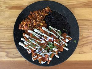 Chilaquiles with tofu scramble & beans  at Capuchino Cafe in La Paz