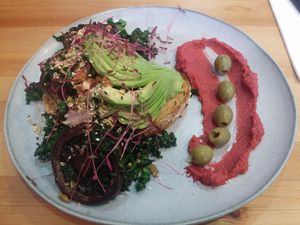 Wonder Vegan: garlic thyme mushrooms, kale, avocado and olives on sourdough with Persian macadamia feta, beetroot hummus, almonds and super seed at Platform 1 Cafe in Ormond