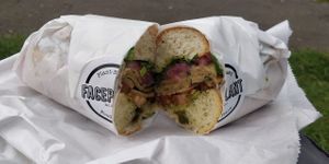Weekend special - Vegan Turky Pesto Sub: Sunflower seed pesto, sliced tomatoes, vegan turky slices, pickled red onion, wild rocket, sub roll at FacePlant Foods in Edinburgh