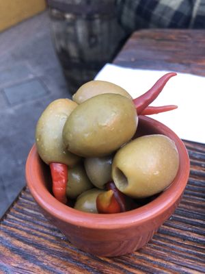 I had to pull the peppers out bc they were so hot 😆 but they sure look pretty and the olives tasted great!  at The Franciscan Well Brewery in Cork