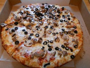 Olive & Mushroom Pizza at Pizza Hub in Arugam Bay