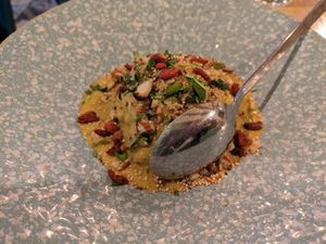 Cauliflower Crunch - a big piece of cauliflower topped with spiced sauce at Nishta in Dubrovnik