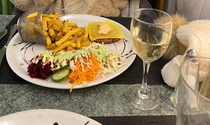 Beyond meat steak with cheese and fries at Délices Veggies in Metz