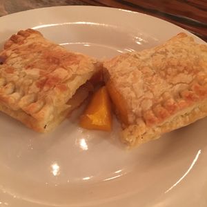 Vegan peach mango hand pie. So good! at Nick's Kitchen in Daly City