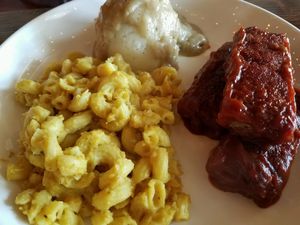 Succulent ribs with 2 sides of choice (mac and cheese and mashed potatoes with gravy) at Nick's Kitchen in Daly City