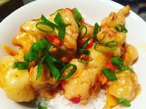 Orange Vegan Chicken tastes better than the real thing.  Battered deep fried Cauliflower tossed in Orange Sauce. at Jackfruit Cafe in West Los Angeles