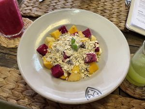 Seasonal fruit salad with muesli, $3  at New Leaf Eatery in Siem Reap