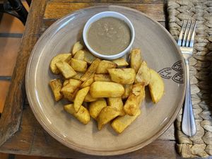 Chips and vegan gravy, $3  at New Leaf Eatery in Siem Reap