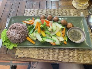 Vegan veggies and omn! meatballs with brown rice option  at New Leaf Eatery in Siem Reap