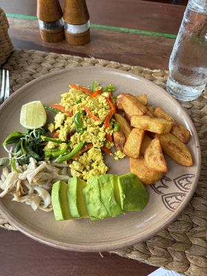 Tofu scramble and avocado, with gluten-free substitutes.  at New Leaf Eatery in Siem Reap