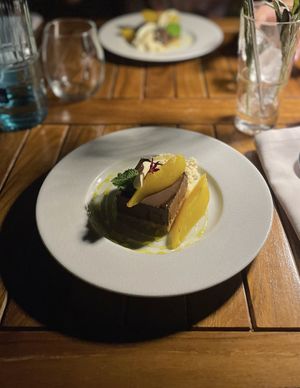 Raw vegan cacao and carob terrine with saffron pears and almond mousse  at Can Domingo in Ibiza