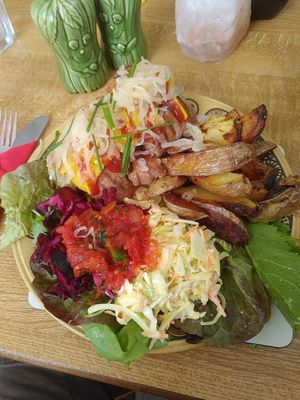 There's a soy-free vegan bratwurst in there somewhere! Home-made wedgies & super super-salad! at Vegan Revelation in Belper