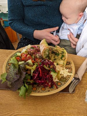 Quiche - menu was out of date so not on there. Served with pesto bread and big salad at Vegan Revelation in Belper