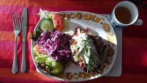 Fantastic spicy chilli-non-carnie and home-made sour cream and chive dressing, home-made coleslaw and salad! at Vegan Revelation in Belper