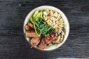 Plant Protein Powerhouse Brekkie (Paleo) - Turmeric & miso scrambled tofu, barbeque tempeh ‘bacon’, thyme-roasted mushrooms, sautéed spinach, sliced avocado and crispy pumpkin & sweet potato hash-browns at Matcha Cafe in Tibubeneng