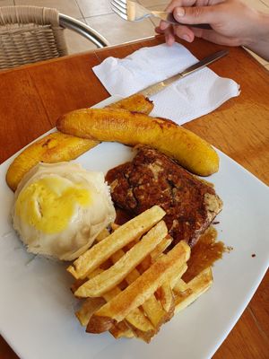 Poor man's tenderloin complete with vegan egg at Restaurant Paracas in Paracas