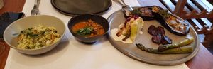 Orzo, channa daal, eggplant with pesto, cauliflower with tahini, grilled dates, asparagus at Betty's Vegetarian Restaurant in Amsterdam