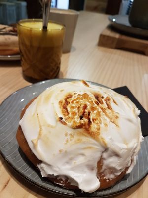 Lemon merengue doughnut and golden milk at Delish Vegan Doughnuts in Madrid