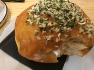Donut salado con crema de queso  at Delish Vegan Doughnuts in Madrid