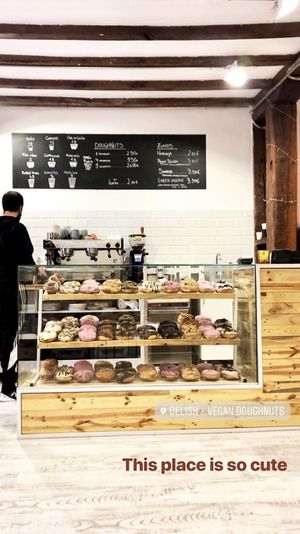 Display case at Delish Vegan Doughnuts in Madrid