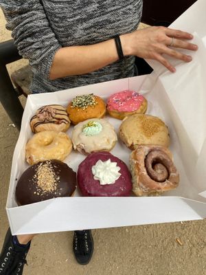 9 different flavours of doughnuts at Delish Vegan Doughnuts in Madrid