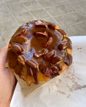 Snickers doughnut 🍩  at Delish Vegan Doughnuts in Madrid
