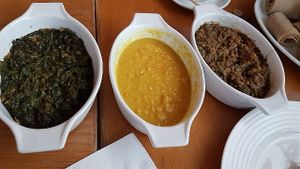 Hamli (spinach dish), atter (split yellow chickpea dish) and brsen (brown lentil dsh) at Keren View in North London