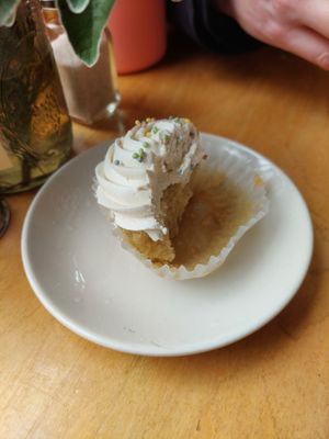 Half eaten vegan cupcake at Blue Scorcher Bakery Cafe in Astoria