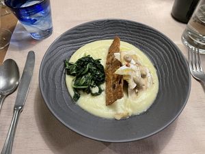 Pignone Parmentière cream, cereal crackers, sautéed chicory and raw Porcini at Il Papeoto in La Spezia