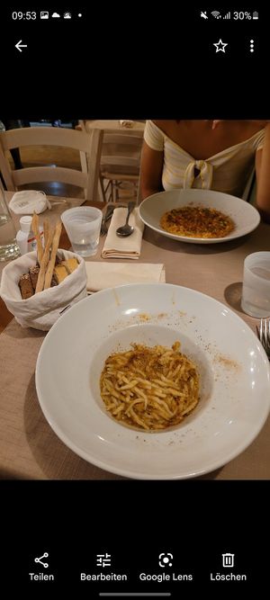 the dining table at Il Papeoto in La Spezia