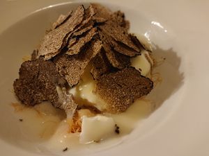 Main course: Poached egg on a basket of kataifi pasta, black truffle and seasoned Cheddar at Il Papeoto in La Spezia