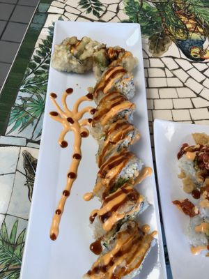 Golden California roll - Vegan crab, cucumber, avocado rolled then tempura fried, drizzled with spicy mayo and unagi sauce. Vegan. at Seed Ranger in Ventura
