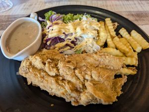 Chicken "Schnitzel" with fried and mushroom souce at Vegan Delights Cafe in Ipoh