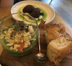 Two of the small plates. Top is artichoke fritti and bottom a pea mousse with focaccia    at No. Twelve in Nottingham
