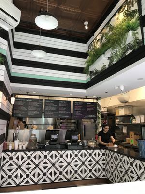 Interior of the restaurant at PLANTA Burger in Toronto