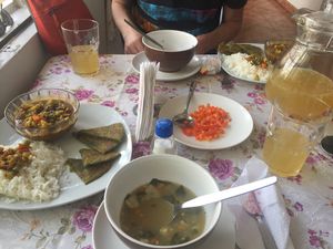 Soup, curry with rice and spinach bread, sweet beverage  at Krishna Bhog in Huaraz