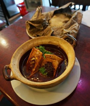 Marmite au tofu farci + Riz gluant au poulet dans une feuille de lotus at Bodhi Vegan in Paris